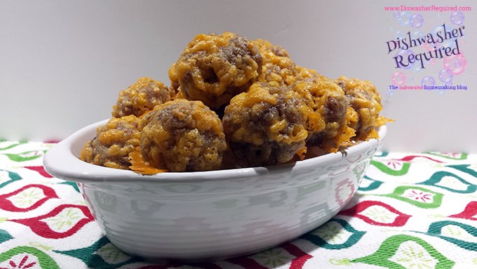 Sausage balls without Bisquick? Yes please! Easy, decadent, pork-a-licious sausage cheese balls without the hydrogenated oils and chemicals! We make these ahead and then pop them in the oven on Christmas morning. Heaven on a plate!